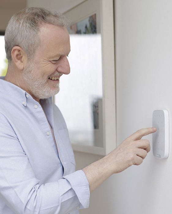 man at homesecure alarm system